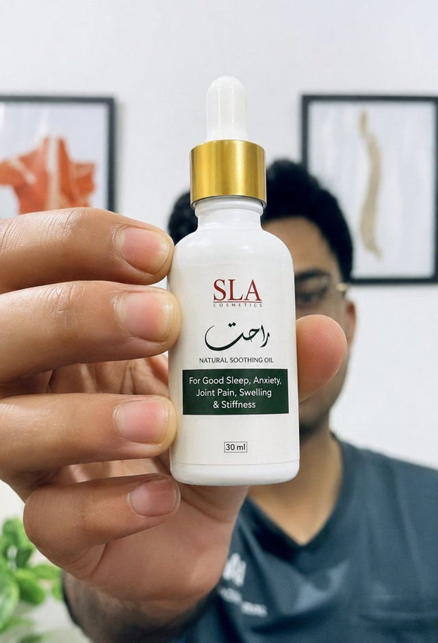 Customer holding a bottle of Rahat Relief Oil
